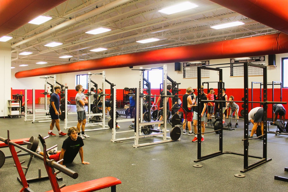 Students workout in the new and improved weight room during a school day in September 2023. 